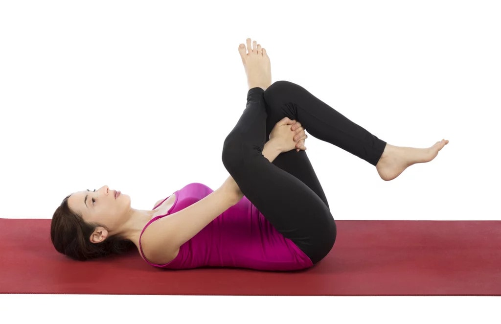 reclined pigeon pose for sciatica stretching