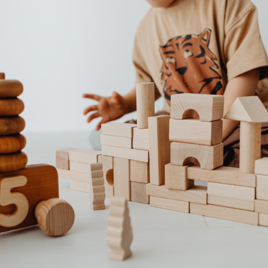 Toddler developmental milestones | playing with blocks | Oona Wellness